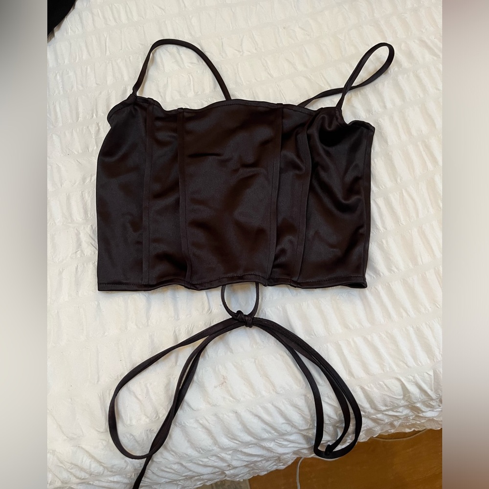 Black going out top